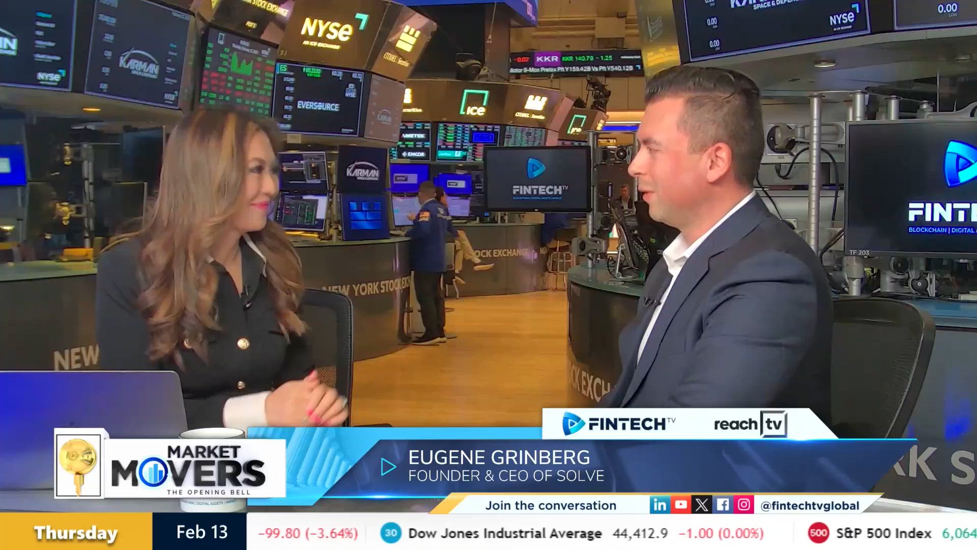Eugene Grinberg, founder and CEO of Solve, speaking in front of stock market screens at the NYSE.